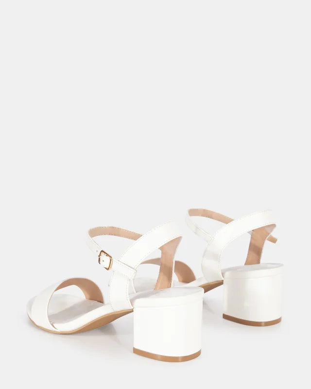 Taurus White low block heel with strap