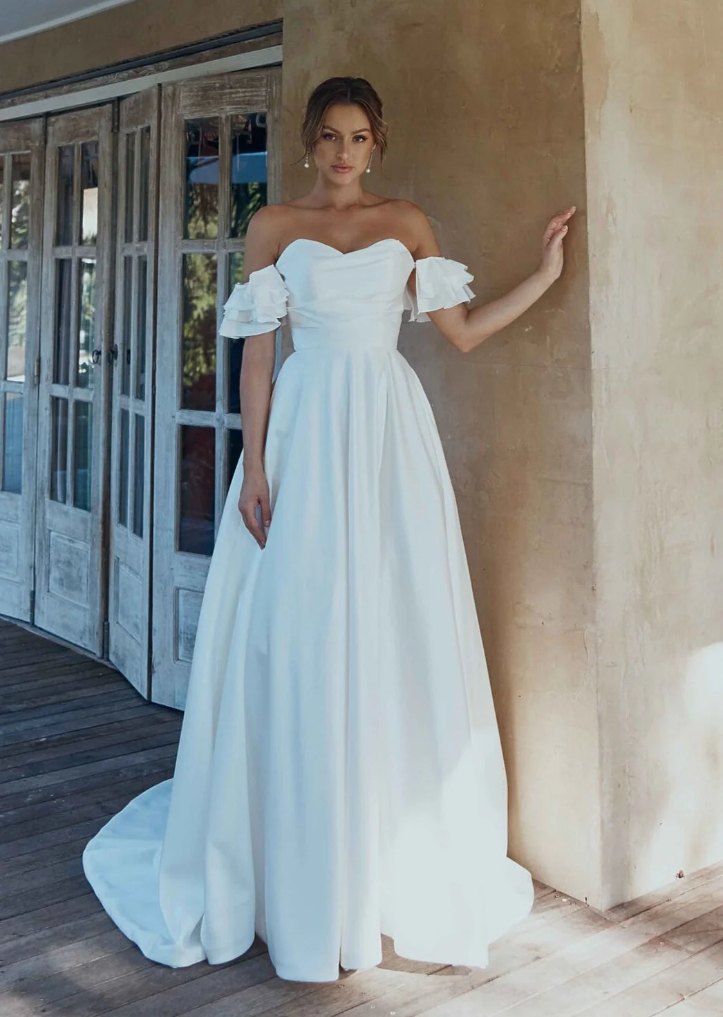 Danica gown Ivory size 10 (Brand new)