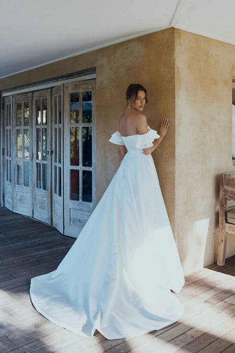 Danica gown Ivory size 10 (Brand new)