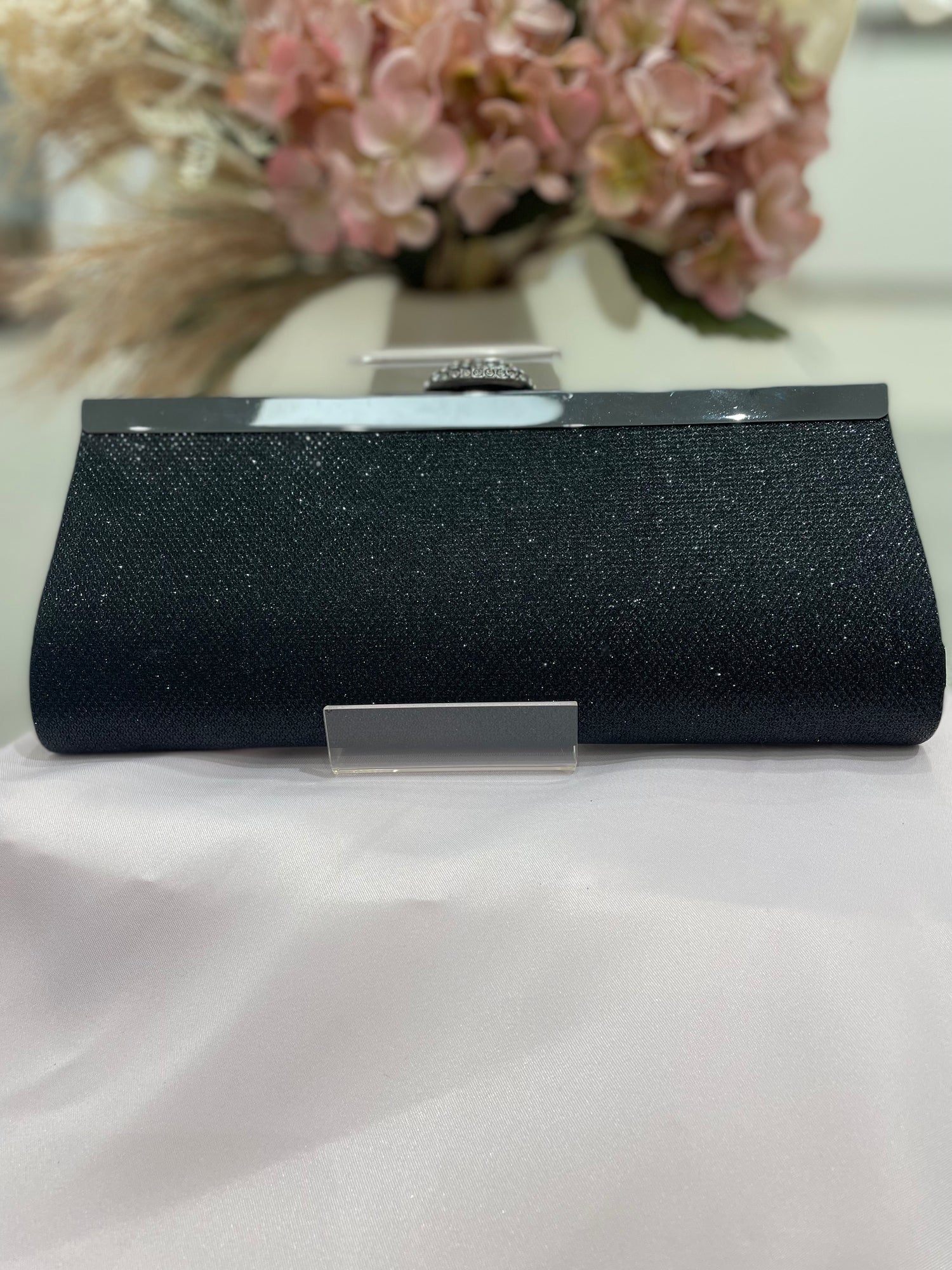 Slim black clutch diamante clasp